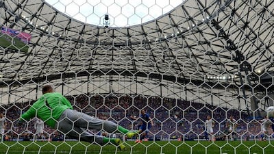 Iceland midfielder Gylfi Sigurdsson shoots a scores a penalty in the nets of Hungary goalkeeper Gabor Kiraly during the Euro 2016 Group F football match between Iceland and Hungary at the Stade Velodrome in Marseille on June 18, 2016. Attila Kisbenedek / AFP