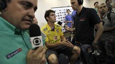 Brazil's Kaka, centre, speaking to journalists after a press conference in Recife, north-eastern Brazil, on Monday.