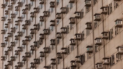 Air conditioners on the side of an apartment building in Pasay, Metro Manila, Philippines. The energy crisis is driving up electricity costs with AC becoming both a necessity and a financial burden. Getty Images