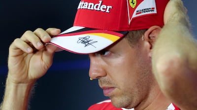 Sebastian Vettel of Ferrari trails Mercedes-GP's Lewis Hamilton by 28 points in the Formula One drivers' championship. Diego Azubel / EPA