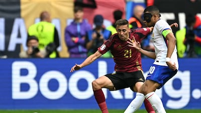 Given unenviable task of dealing with Mbappe but did OK. Moments where he could do nothing against pace of Real Madrid-bound attacker but this is not problem unique to Castagne. AFP