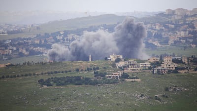 Smoke rises from the site of an Israeli air strike on the village of Kfar Tibnit, Lebanon. AFP