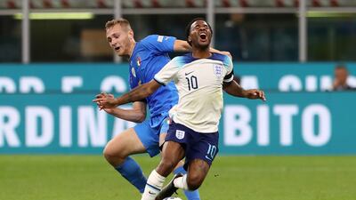 Tommaso Pobega of Italy challenges Raheem Sterling of England. Getty