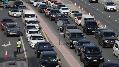 Roads across the UAE are busier early in the afternoon during Ramadan as people finish work. Chris Whiteoak / The National