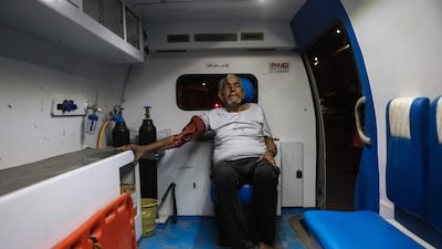 An injured Palestinian man waits in an ambulance outside Nasser Hospital after an Israeli strike in Khan Younis, southern Gaza. AFP