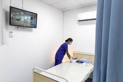 A nurse in a general ward of a field hospital in Al Wathba, Abu Dhabi on May 13. Antonie Robertson / The National
