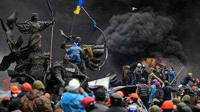 Anti-government protesters clashed with police in Independence square, despite a truce agreed between the Ukrainian president and opposition leaders on February 20 in Kiev, Ukraine. Jeff J Mitchell / Getty Images