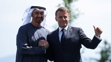 President Sheikh Mohamed is welcomed by French President Emmanuel Macron to the G7 summit in Evian-les-Bains. Reuters