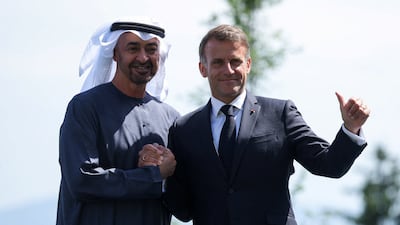 President Sheikh Mohamed is welcomed by French President Emmanuel Macron to the G7 summit in Evian-les-Bains. Reuters