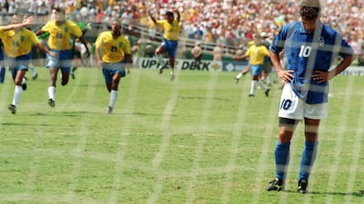 As spectacular as Roberto Baggio, right, had been for Italy in the 1994 World Cup, many remember him only for missing his spot kick in the final that gave Brazil a 3-2 win in the shoot-out session over Italy. Omar Torres / AFP