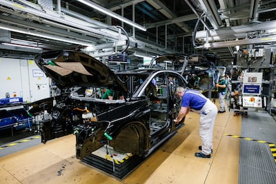 Workers assemble Volkswagen ID.5 electric cars at the company's Zwickau plant in Germany. Getty