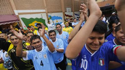 Prisoners participate in the opening ceremony of their own Prison World Cup ahead of the 2014 World Cup at the Castro-Castro prison in Lima on Monday. Mariana Bazo / Reuters / June 2, 2014