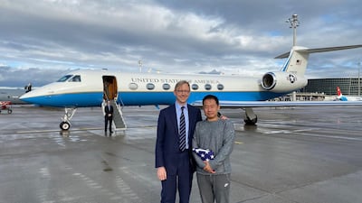 US Special Representative for Iran Brian Hook welcomes Princeton graduate student Xiyue Wang on arrival in Switzerland after his release from Iran. AFP