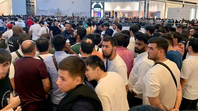 People queue for the iPhone 15 at Mall of the Emirates in Dubai. Pawan Singh / The National
