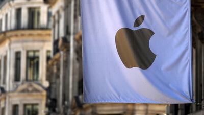 Apple's flag hangs from its UK headquarters in London. The company briefly surpassed a value of $2 trillion on Wednesday, regaining the position of the world's most valuable company. EPA