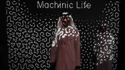 An Emirati man poses for a photo at the Museum of the future during the opening day of the World Government Summit in Dubai. Kamran Jebreili / AP Photo