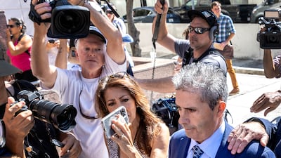 Carlos De Oliveira, right, a property manager at Donald Trump's resort Mar-a-Lago, enters a hearing in Miami, Florida, accused of helping move classified information, lying and trying to destroy surveillance footage. EPA