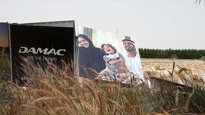 Barriers were blown down in the Damac Hills district, among other areas. All photos by Pawan Singh / The National