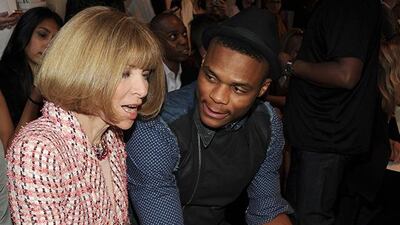 NEW YORK, NY - SEPTEMBER 06: Conde Nast Artistic Director Anna Wintour and NBA basketball player Russell Westbrook attend the Rag & Bone Women's Collection Spring 2014 fashion show during Mercedes-Benz Fashion Week at Skylight at Moynihan Station on September 6, 2013 in New York City. Ben Gabbe/Getty Images/AFP