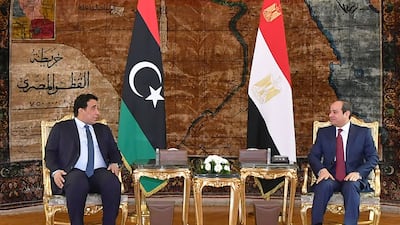 Egyptian President Abdel Fattah El Sisi (R) meets the Chairman of the Presidential Council of Libya, Mohamed Al Menfi at the presidential palace in Cairo. Photo: Egyptian Presidency
