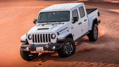 The off-roader lopes across moderately sized dunes with relative ease