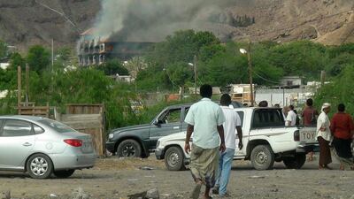 Flames and smoke rise from Sheikh bin Farid palace. Saleh Al-Obeidi / AFP