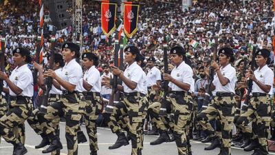 Indian Border Security Force personnel march at a ceremony to celebrate Independence Day, at the India-Pakistan Wagah border post. AFP