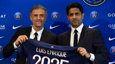 New PSG manager Luis Enrique, left, with club president Nasser Al Khelaifi on Wednesday, July 5, 2023. AP