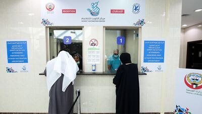Kuwaitis arrive to receive their Covid-19 vaccines at Al-Masayel vaccination centre in Kuwait City, on February 7, 2021. AFP