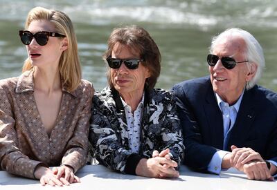 'The Burnt Orange Heresy' cast members, Elizabeth Debicki, Mick Jagger and Donald Sutherland arrive for a photocall during the 2019 Venice Film Festival. AFP
