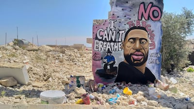 A mural of George Floyd in Idlib, Syria, by Syrian artists Aziz Asmar and Anis Hamdoun. Aziz Asmar
