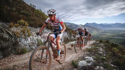 Rick Reimann from Switzerland competes during Stage 1 of the Absa Cape Epic mountain bike race in South Africa on Monday. Nic Bothma / EPA