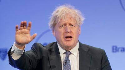 Boris Johnson stepped down as prime minister last year following the partygate scandal. PA / AP