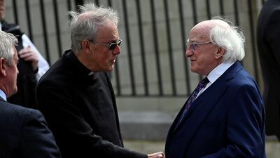 Ireland's President Michael D. Higgins arrives at the funeral. Reuters