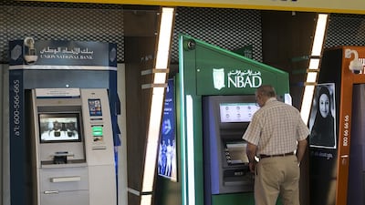 UAE banks enjoy high levels of capital and can maintain steady dividend payout ratios even if profits decrease. Mona Al Marzooqi / The National