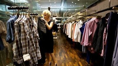 Personal stylist Kelly Lundberg shops at Reiss in Dubai Mall on February 19, 2012. Christopher Pike / The National