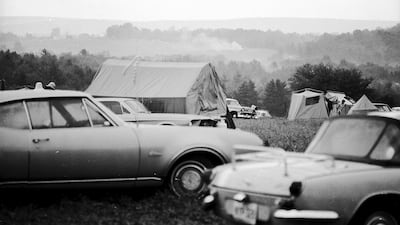 Cars and tents at the Woodstock Music Festival. Barry Serben / The Museum at Bethel Woods via Reuters