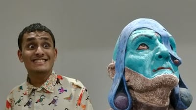 Sid, who is autistic, wears a tactile magnetic shirt-kurta. The magnets help him relax as he plays with them, keeping his senses engaged. Photo: Move Ability