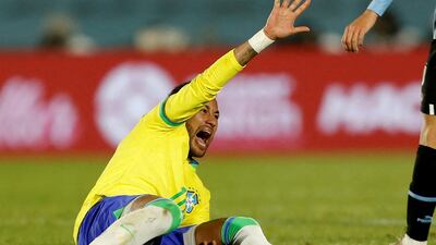 Brazil's Neymar reacts after sustaining a serious knee injury against Uruguay. Reuters