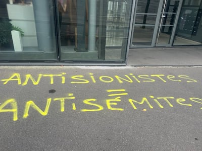 Graffiti on the pavement outside Carep's building were found on the second day of the conference. Sunniva Rose/The National.