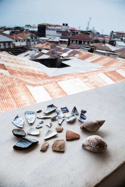 A selection of ceramic finds reveal the trading ties that made up the triangular, Indian Ocean trade including 18th century porcelain from China (top), 14th-16th century pottery from Hormuz and 18th/19th century ceramics from the Arabian Gulf (bottom).