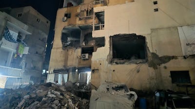 Damage caused to a building following an Israeli air strike that attacked a neighbourhood in the southern Lebanese city of Tyre on March 22, 2025. AFP