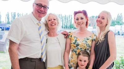 In happier times. Ms Garvey, far right, with her mother, father and sister.