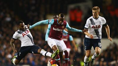 Diafra Sakho of West Ham United is challenged by Danny Rose, left, and Eric Dier of Tottenham in the Spurs’ 4-1 win over West Ham United at White Hart Lane in London. Clive Rose / Getty Images
