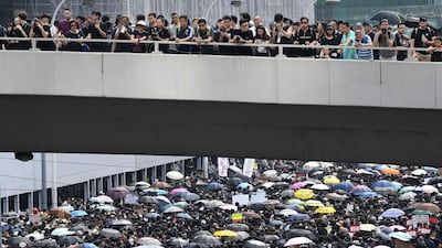 Protesters attend a rally against a controversial extradition law proposal in Hong Kong . AFP