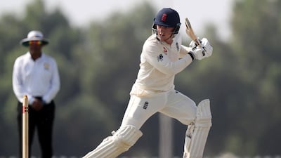 Bess bats in the game.