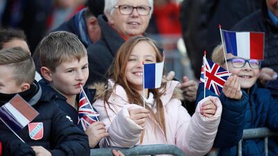 Children wave French and British flags in Albert, northern France, in 2018. AP Photo