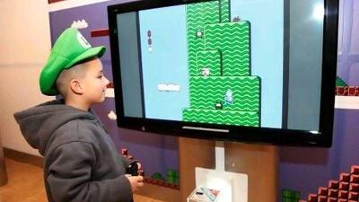 The music of Super Mario Bros might draw children to the symphony. Victoria Will / AP Images for Nintendo