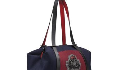 Christian Louboutin’s Bagdamon weekend bag in carmin Dh6,990. Courtesy Christian Louboutin