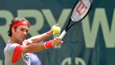 Roger Federer shown during his second round win at the Gerry Weber Open over Joao Sousa on Thursday. Carmen Jaspersen / AFP / June 12, 2014